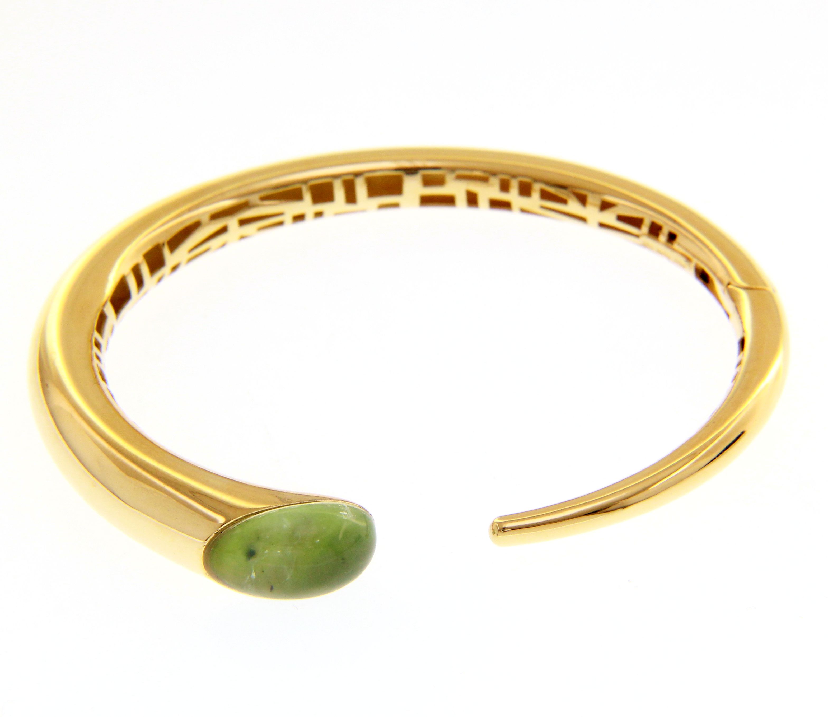Beautiful 18ct Yellow Gold Composite Stone Contrarie Bangle. We have different stones . Contact us for more information about the colours of enamel, gold and stones in our shop.